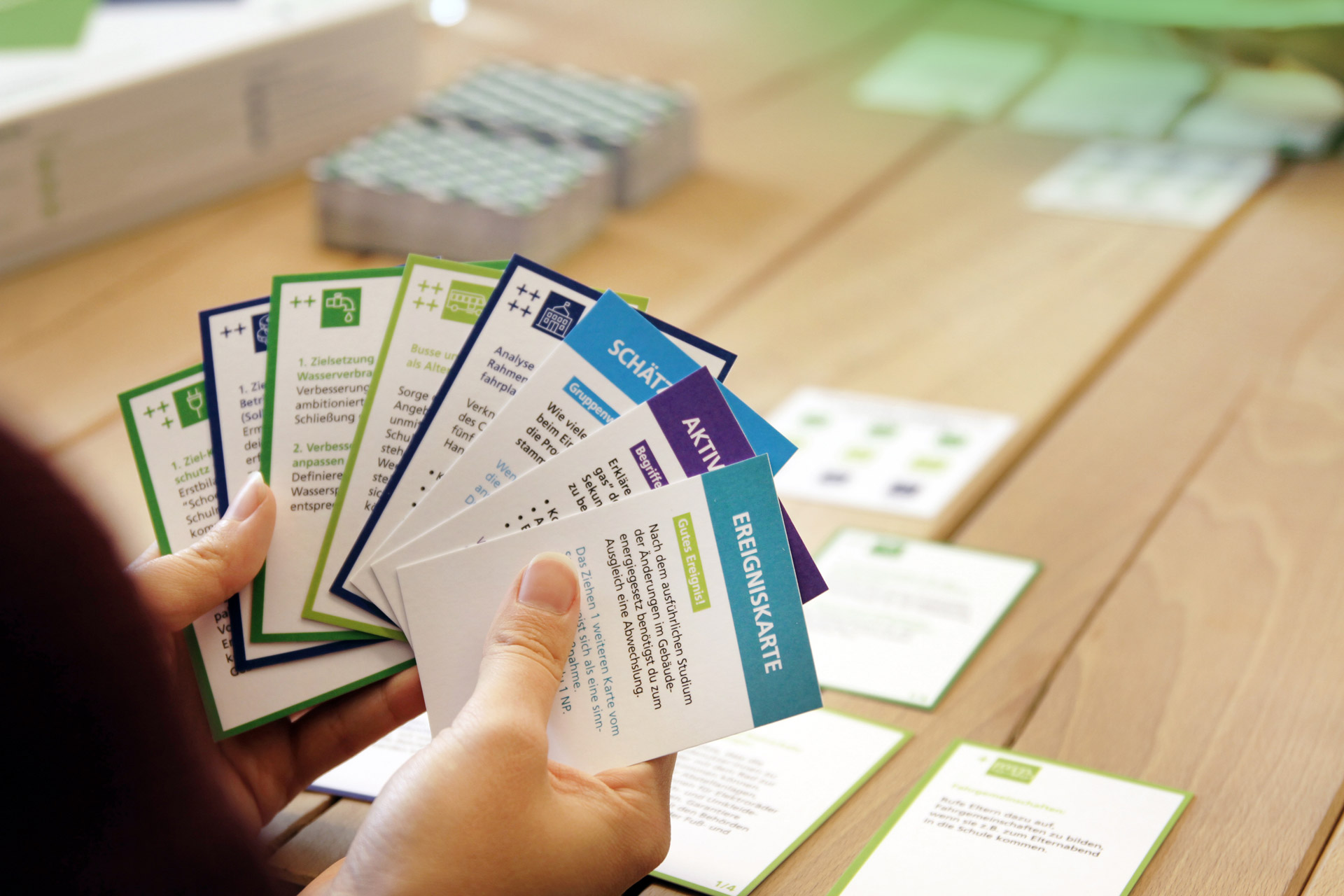 Hands holding a deck of cards